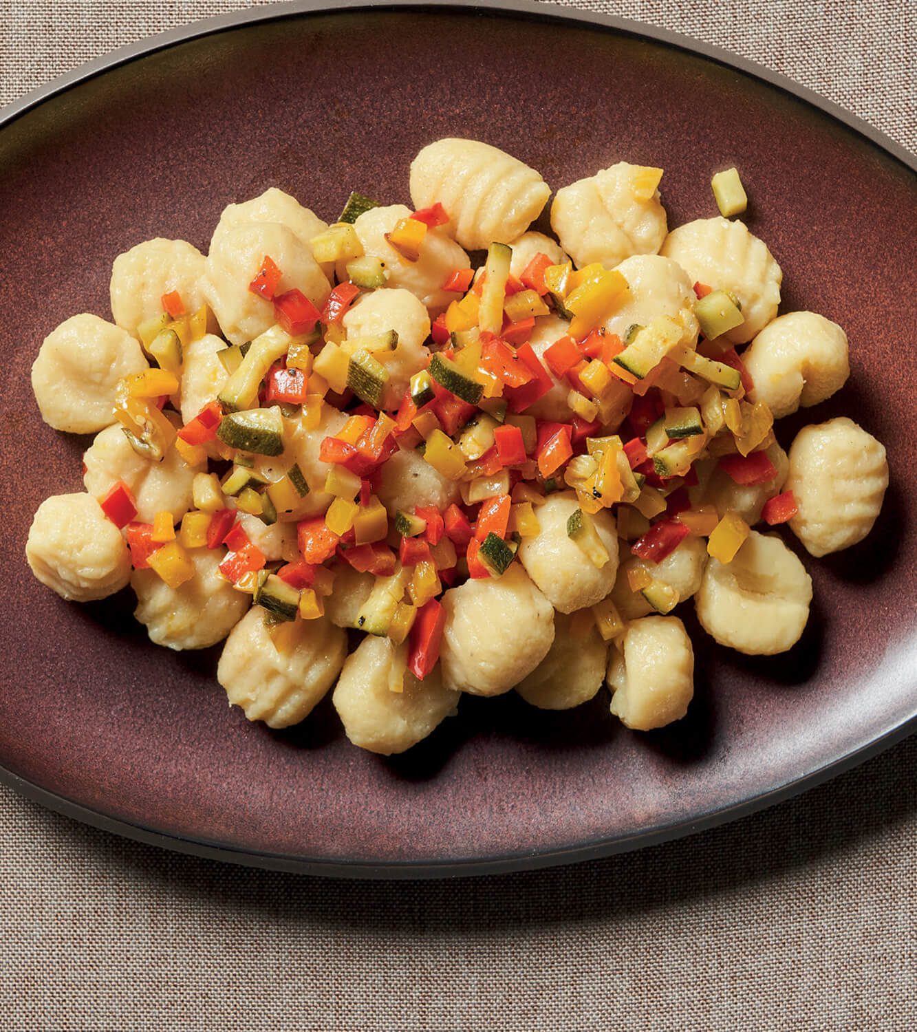 Organic eggless striped potato gnocchi with sweet and sour diced