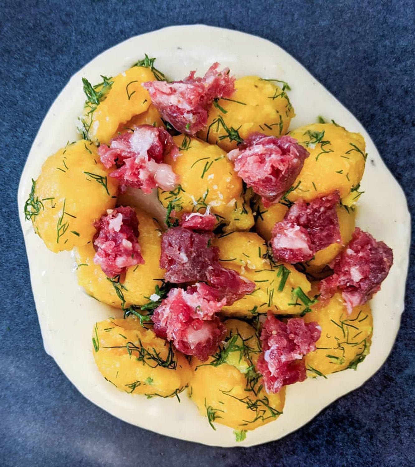 Gnocchi di zucca con salame di turgia, parmigiano e finocchietto